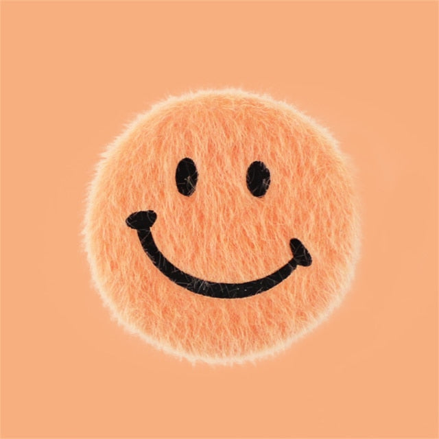 Fluffy Smiley Face Phone Grip