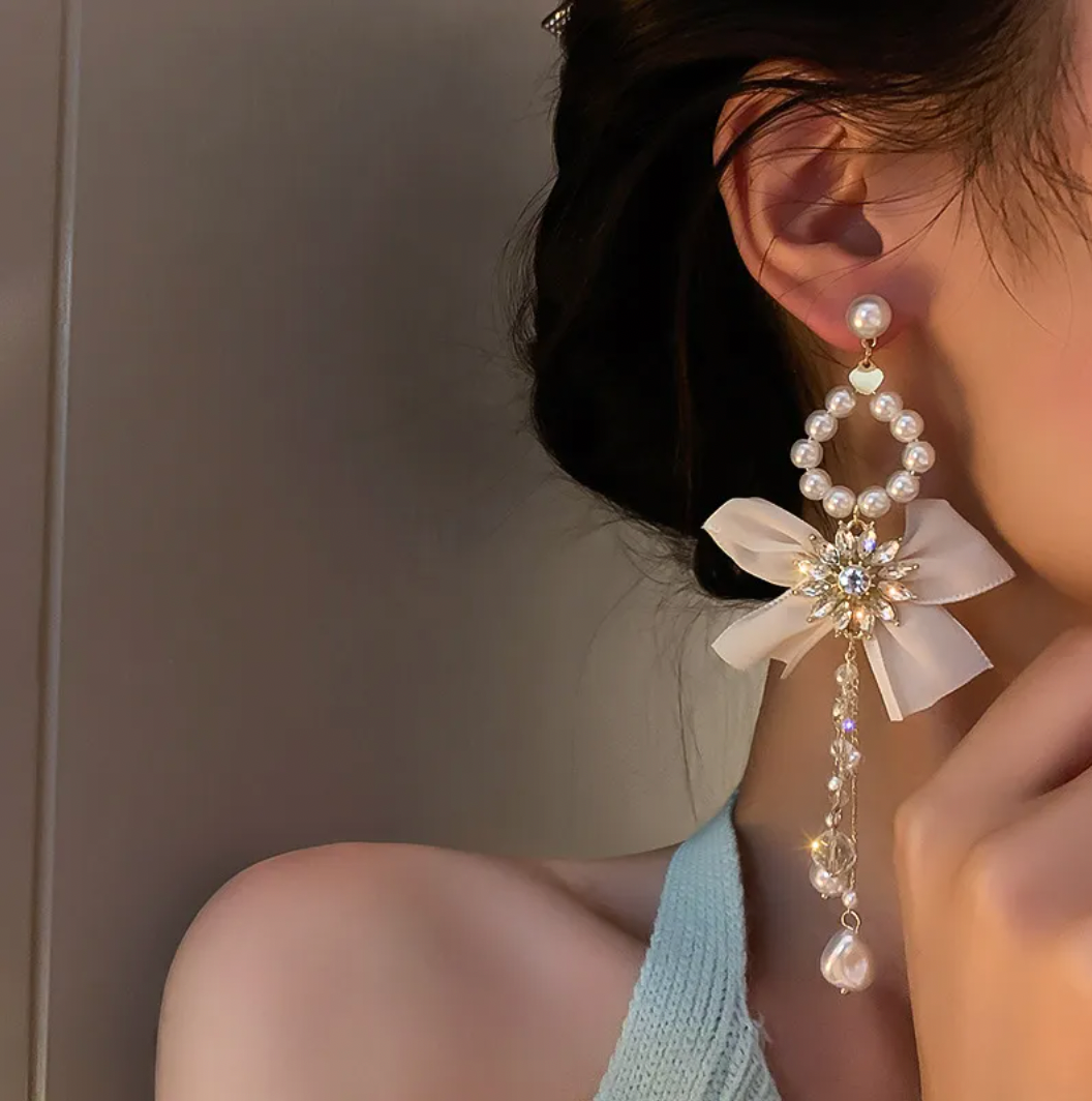 Share more than 210 big dangle earrings latest