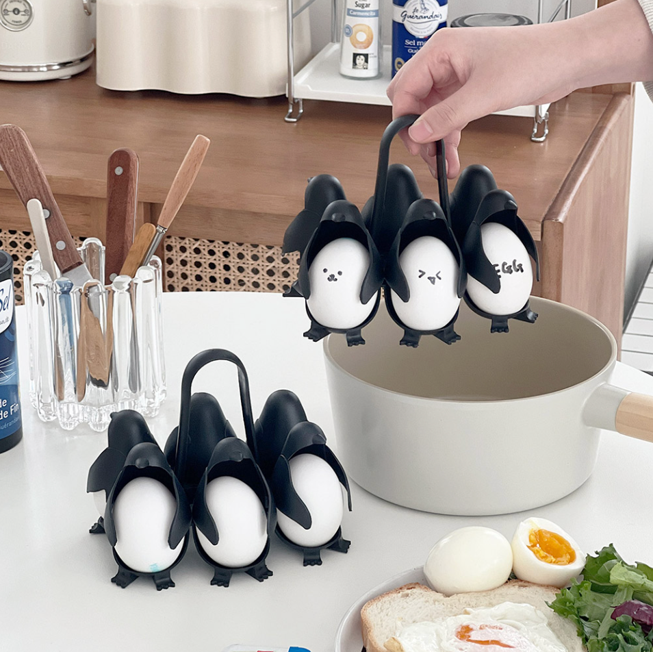 This adorable egg-holder and boiler turns your poultry into